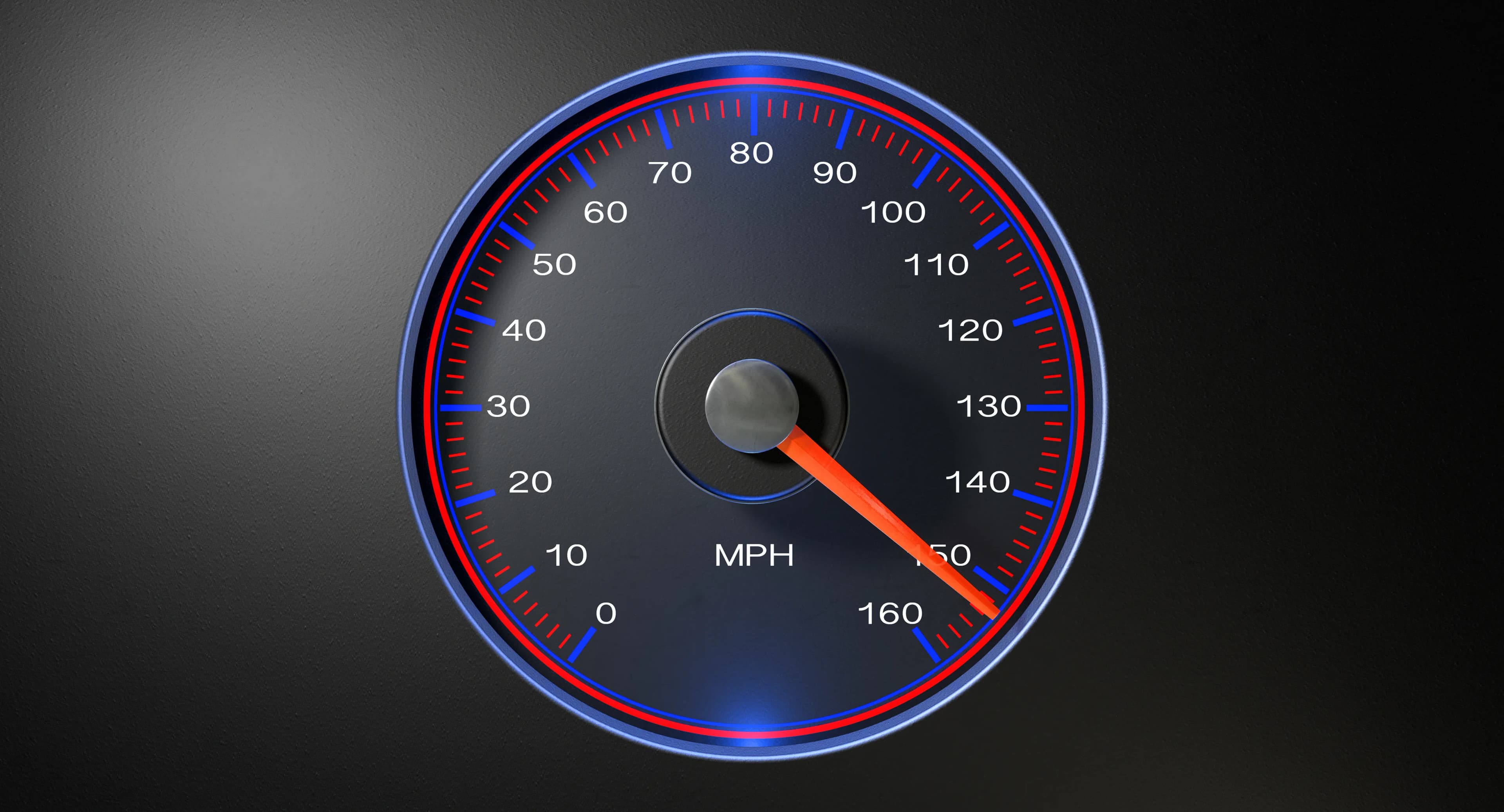 Close-up of a speedometer with the needle at high speed